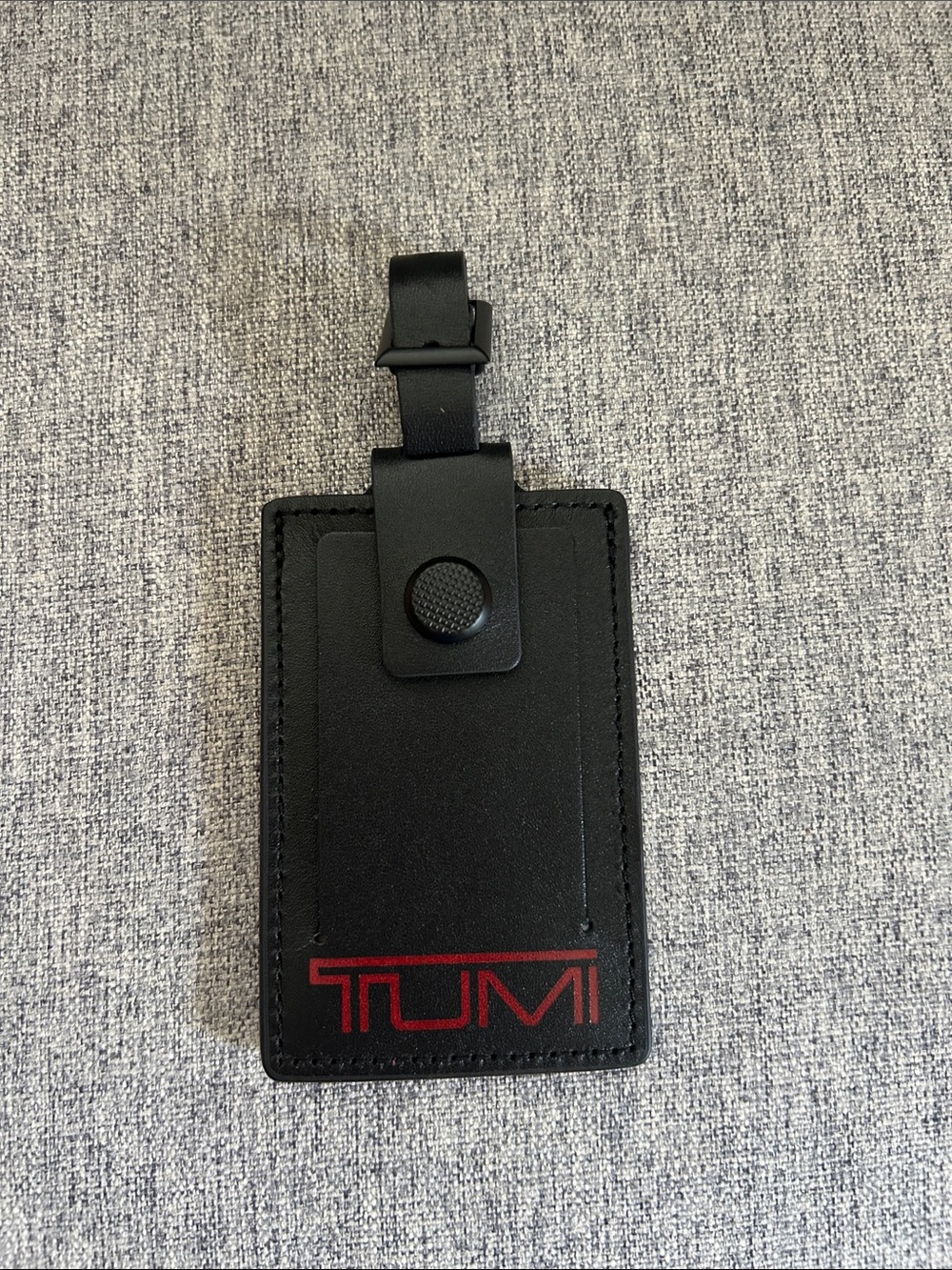 Tumi Black Leather Luggage Tag with Red Logo
